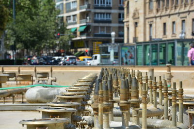 Dry fountain with light bulbs un a city