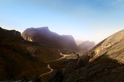 Scenic view of rocky mountains against clear sky