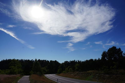 Scenic view of landscape against cloudy sky