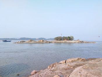 Scenic view of sea against clear sky