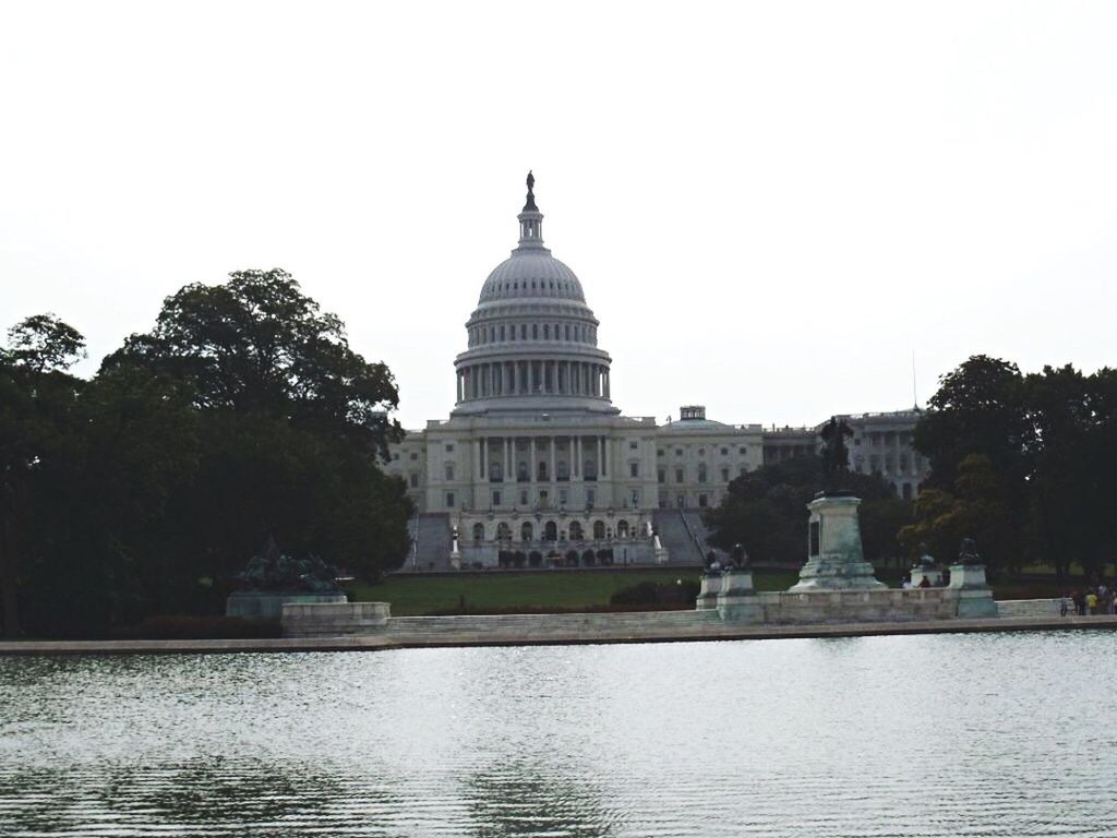 VIEW OF BUILDING WITH WATERFRONT