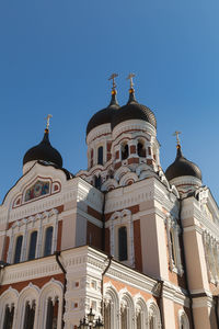 Low angle view of building against blue sky