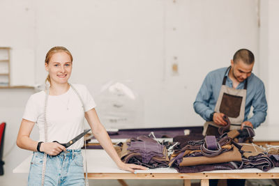 Portrait of young man working in workshop