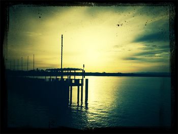 Scenic view of sea against sky at sunset