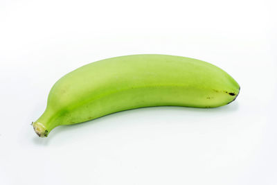Close-up of green pepper against white background
