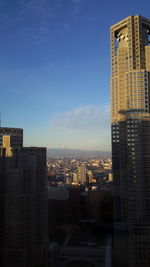 High angle shot of cityscape blue sky