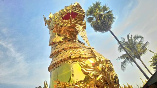 Low angle view of statue against sky