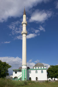 View of building against cloudy sky