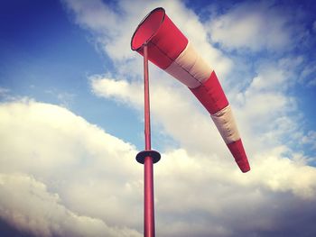 Low angle view of windsock blowing in wind