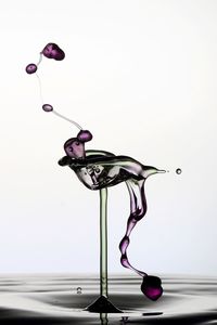 Close-up of electric lamp against white background