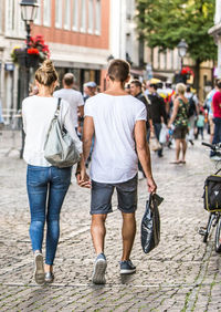 Woman standing on city street