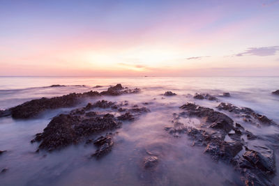 Scenic view of sea against sky during sunset