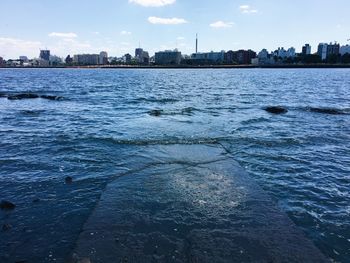 View of river with buildings in background