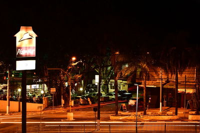 Illuminated city against sky during winter