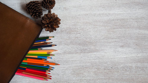 High angle view of multi colored pencils on table