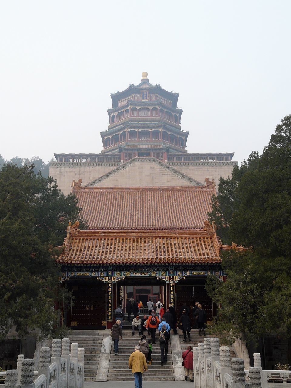 GROUP OF PEOPLE IN FRONT OF BUILDING