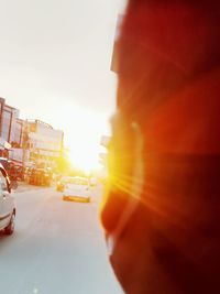 View of city street during sunset