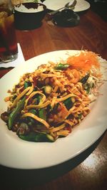 Close-up of served food on table