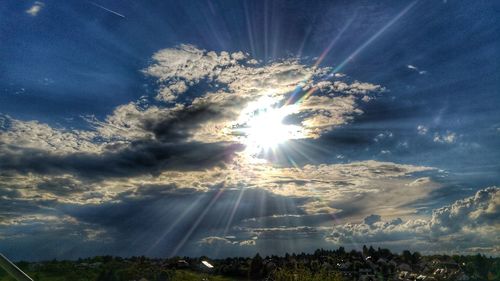 Low angle view of vapor trails in sky