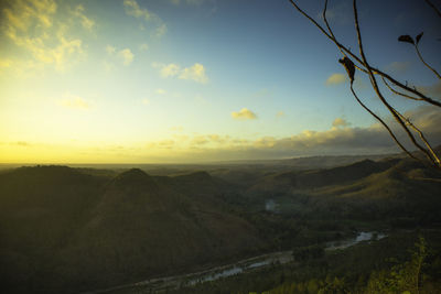 Scenic view of landscape against sky during sunset