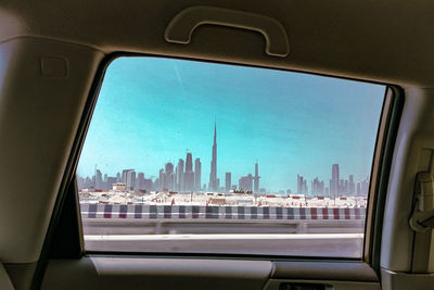 Cityscape seen through car window