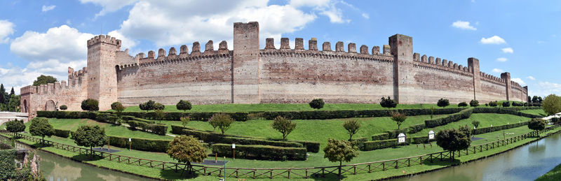 Panoramic shot of historic building against sky