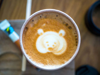 Close-up of cappuccino on table