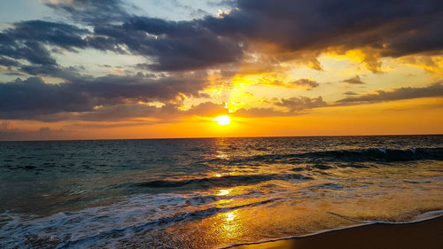 Scenic view of sea against sky during sunset