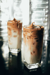 Close-up of ice cream in glass on table