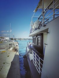 Boats moored at harbor