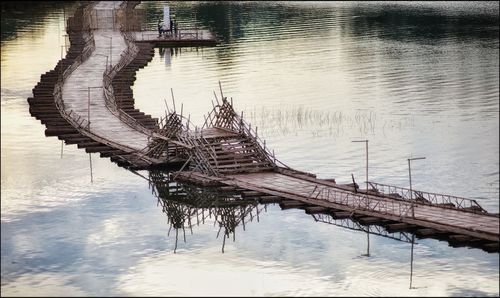 Reflection of bridge over lake