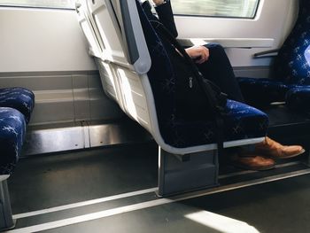 Low section of man in car