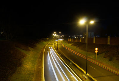 Light trails on road at night