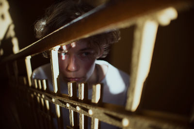 Portrait of man looking away in building