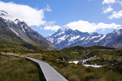 Scenic view of mountains against sky during winter