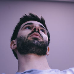 Portrait of man against gray background