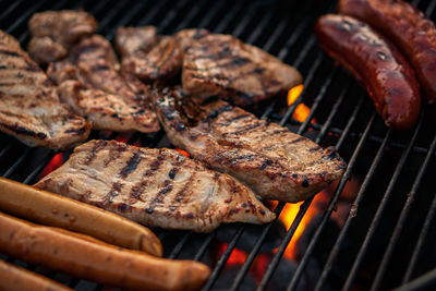 Close-up of meat on barbecue grill