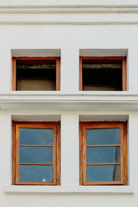 Low angle view of window of house