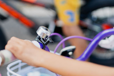 Cropped hand of man repairing car