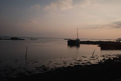 View of calm sea at sunset