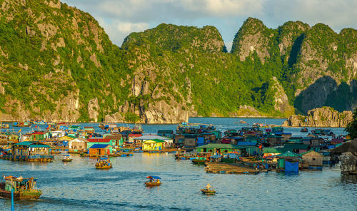 Panoramic view of boats moored in sea