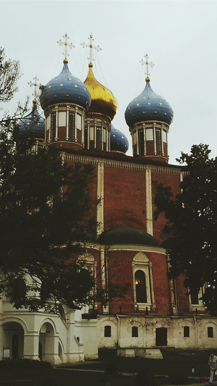 architecture, building exterior, built structure, place of worship, religion, dome, spirituality, church, low angle view, clear sky, facade, tree, sky, arch, window, day, outdoors, cathedral