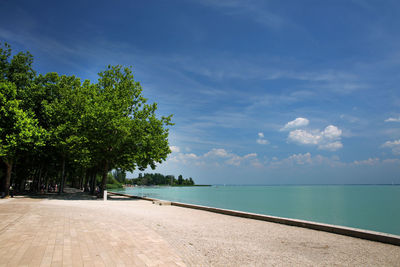 Scenic view of sea against blue sky