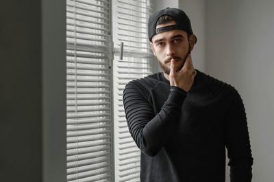 Portrait of man working in office