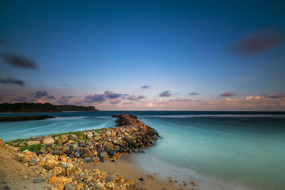 Scenic view of sea against sky during sunset