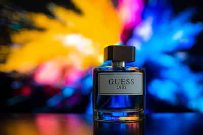 Close-up of glass bottle against blurred background