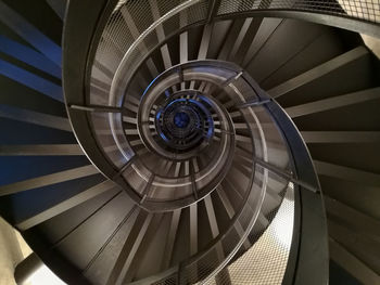 Directly below shot of spiral staircase in building