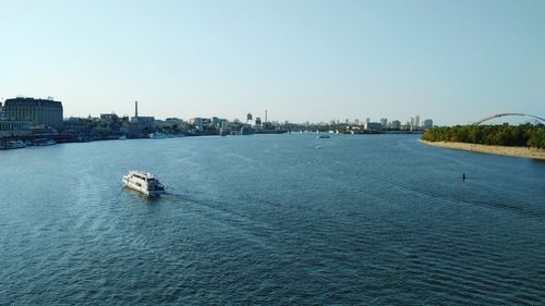 Panoramic view of sea and buildings against clear sky