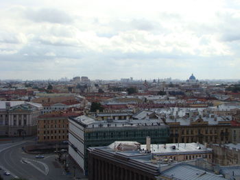 High angle view of buildings in city against sky