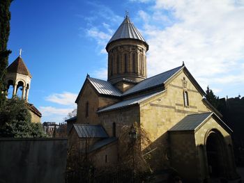 Low angle view of buildings against sky